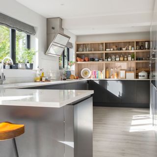 kitchen with marble worktop and shelves