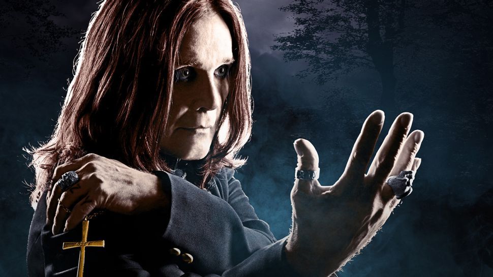 Ozzy Osbourne holding out his hand