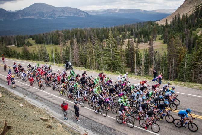 The peloton nears the top of todays climb.