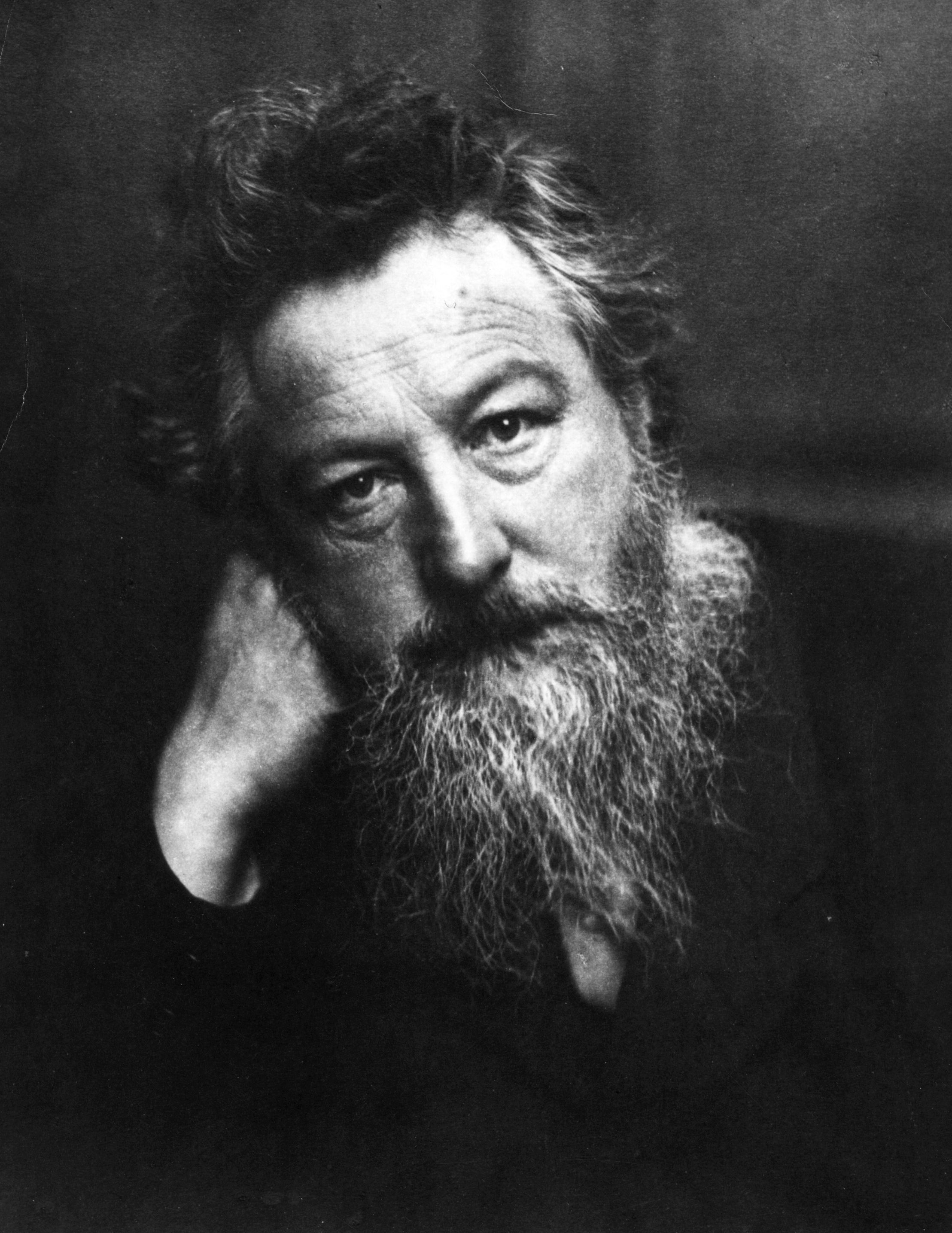 A black and white photo of William Morris