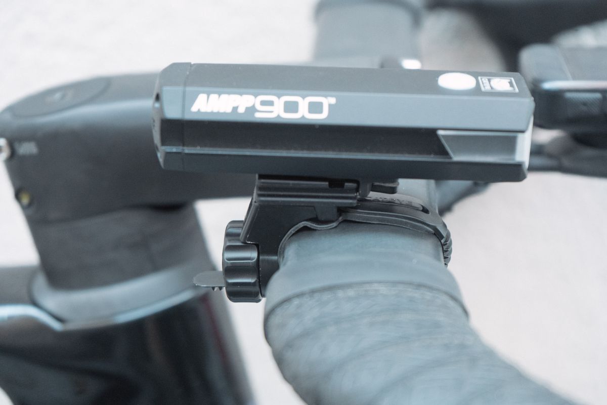 A close up of the side of a bike light's mounting bracket