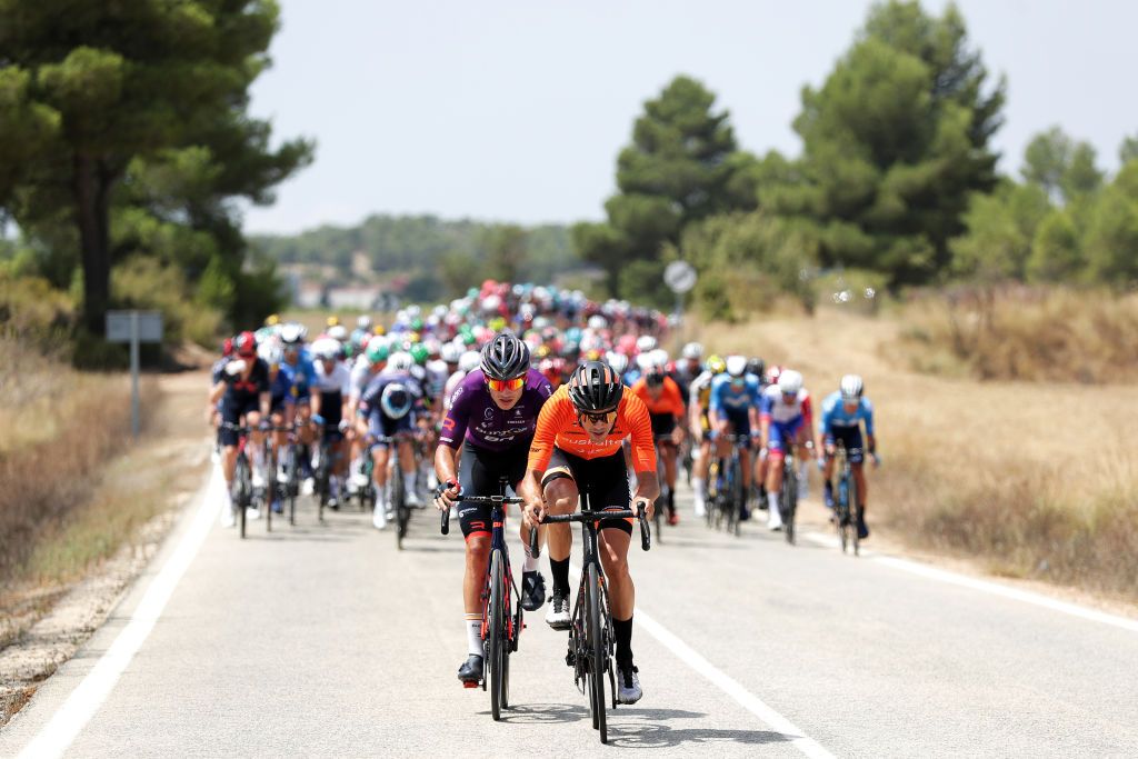ALTO DE LA MONTAA DE CULLERA SPAIN AUGUST 19 LR Jetse Bol of Netherlands and Team Burgos BH and Joan Bou Company of Spain and Team Euskaltel Euskadi attack during the 76th Tour of Spain 2021 Stage 6 a 1583km stage from Requena to Alto de la Montaa de Cullera 184m lavuelta LaVuelta21 on August 19 2021 in Alto de la Montaa de Cullera Spain Photo by Gonzalo Arroyo MorenoGetty Images