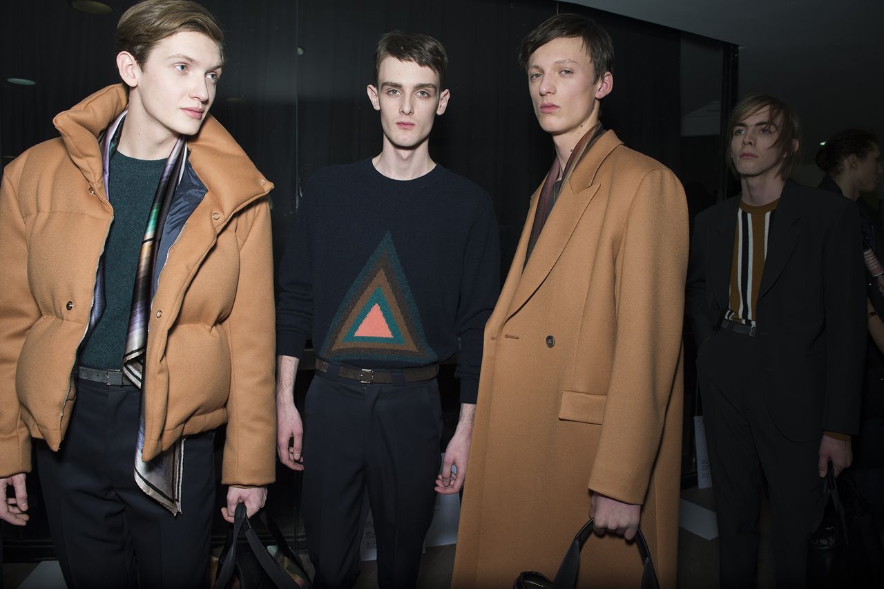 Three male models wearing Paul Smith clothing