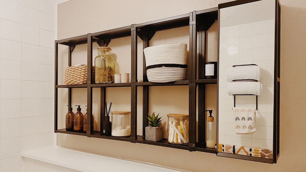 Budget bathroom makeover: Annie&#039;s bathroom with IKEA ENHET cabinets on wall, decorated with accesesories