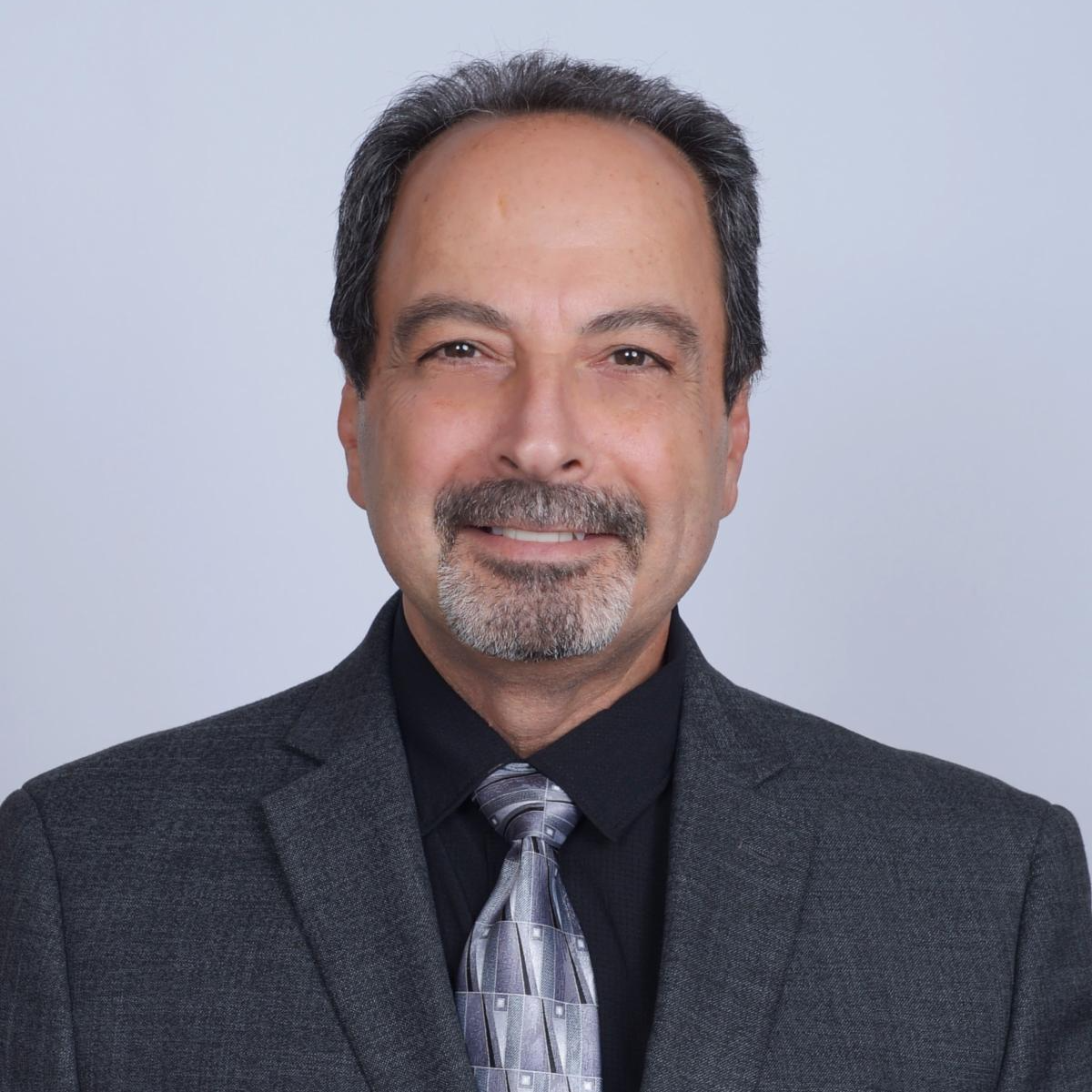Smiling headshot of Abed Zein.