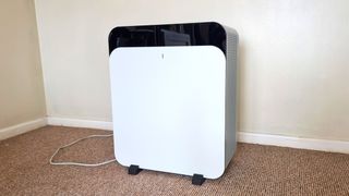 BlueAir Classic Pro CP7i air purifier being tested by our reviewer