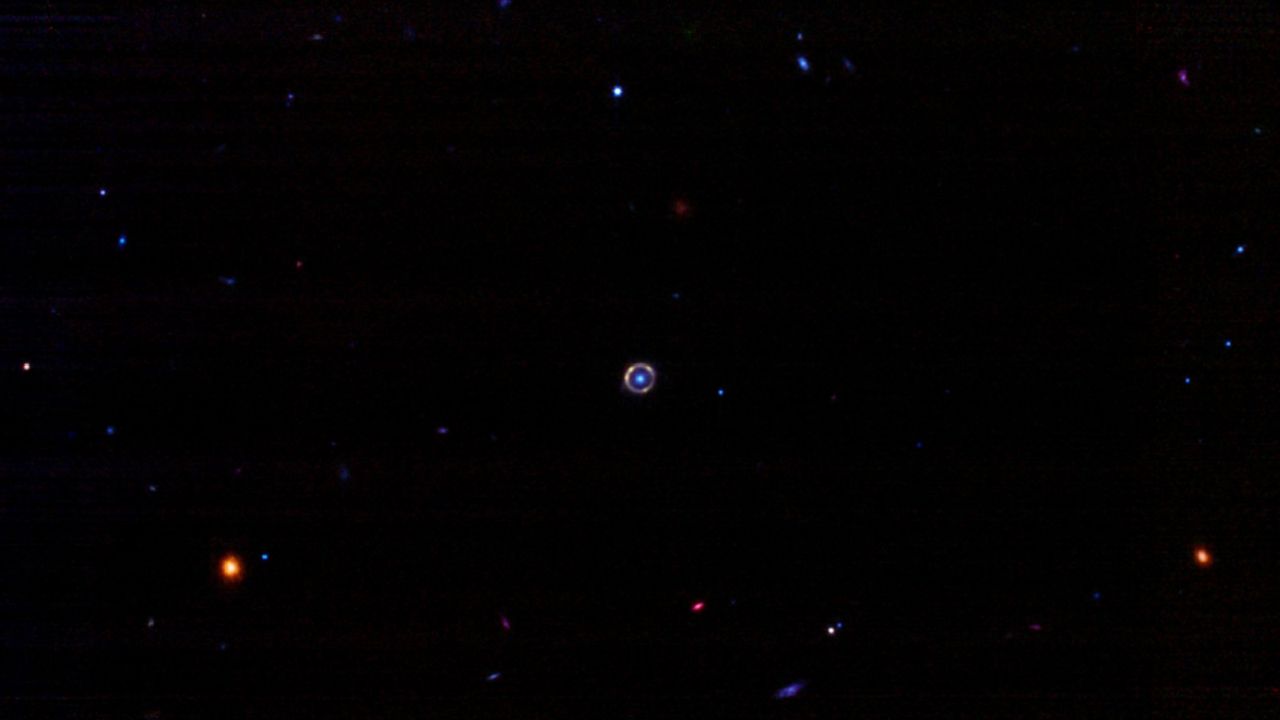 A near-perfect Einstein ring from the galaxy JO418.