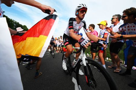 PLATEAU DE SOLAISON, FRANCE - JULY 19: Brandon McNulty of United States and UAE Team Emirates - XRG competes while fans cheer at the Plateau de Solaison (1501m) during the 113th Tour de France 2026, Stage 15 a 183.9km a 155.3km stage from Champagnole to Plateau de Solaison 1501m / #UCIWT / on July 19, 2026 in Plateau de Solaison, France. (Photo by Tim de Waele/Getty Images)