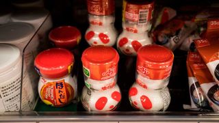 Ajinomoto's MSG products on a shelf at a supermarket