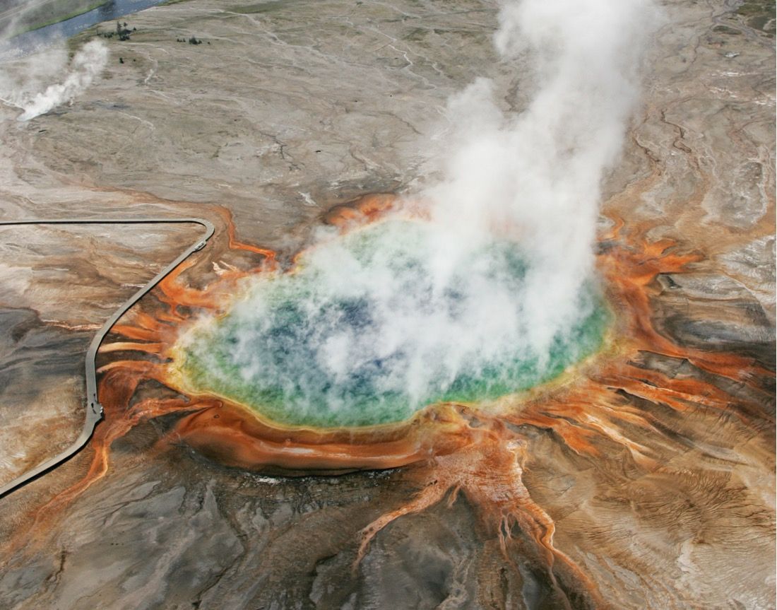 The concentric colors of Yellowstone&#039;s Grand Prismatic hot spring can be seen from above.