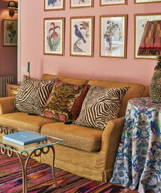 Retro living room with a mustart yellow sofa dressed with animal print cushions