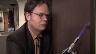 Dwight heating up the door handle in The Office