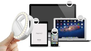 The Xinbaohong Clip-On Selfie Light mounted to a phone, tablet, laptop and computer monitor