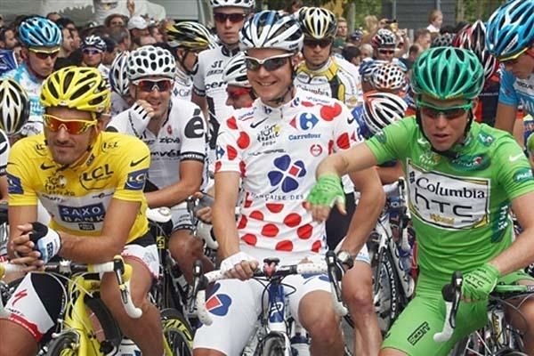 Yellow jersey Fabian Cancellara (Saxo Bank), Polka dot jersey Jussie Veikkanen (Francaise des Jeux) and Green jersey Mark Cavendish (Columbia-HTC)