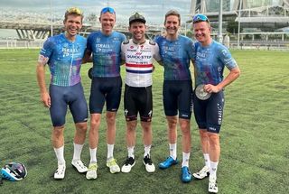 Cavendish posing with Israel riders in Singapore in October