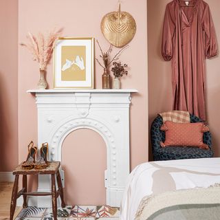 pink bedroom with fireplace