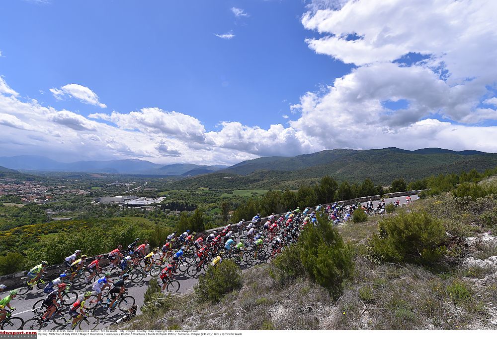 The peloton winding its way through Italy's scenic terrain