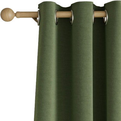 green thermal curtains on a wooden curtain rail
