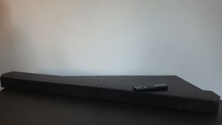 Samsung HW-Q800D main soundbar with remote on top