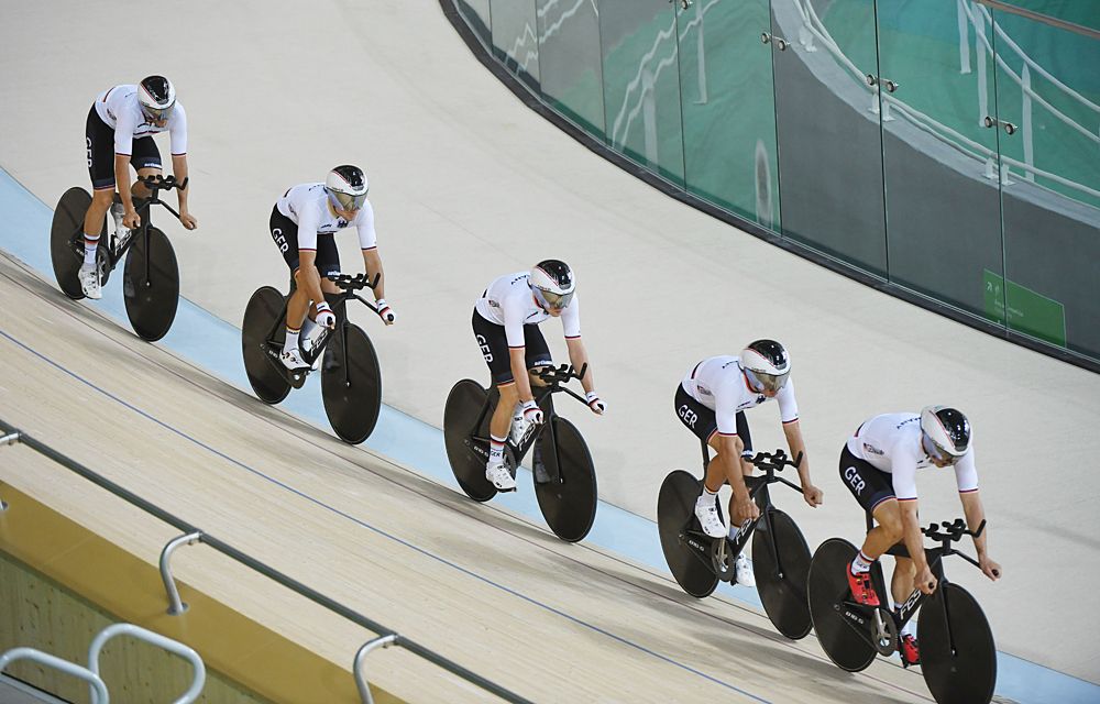 The German team pursuiters train on the velodrome