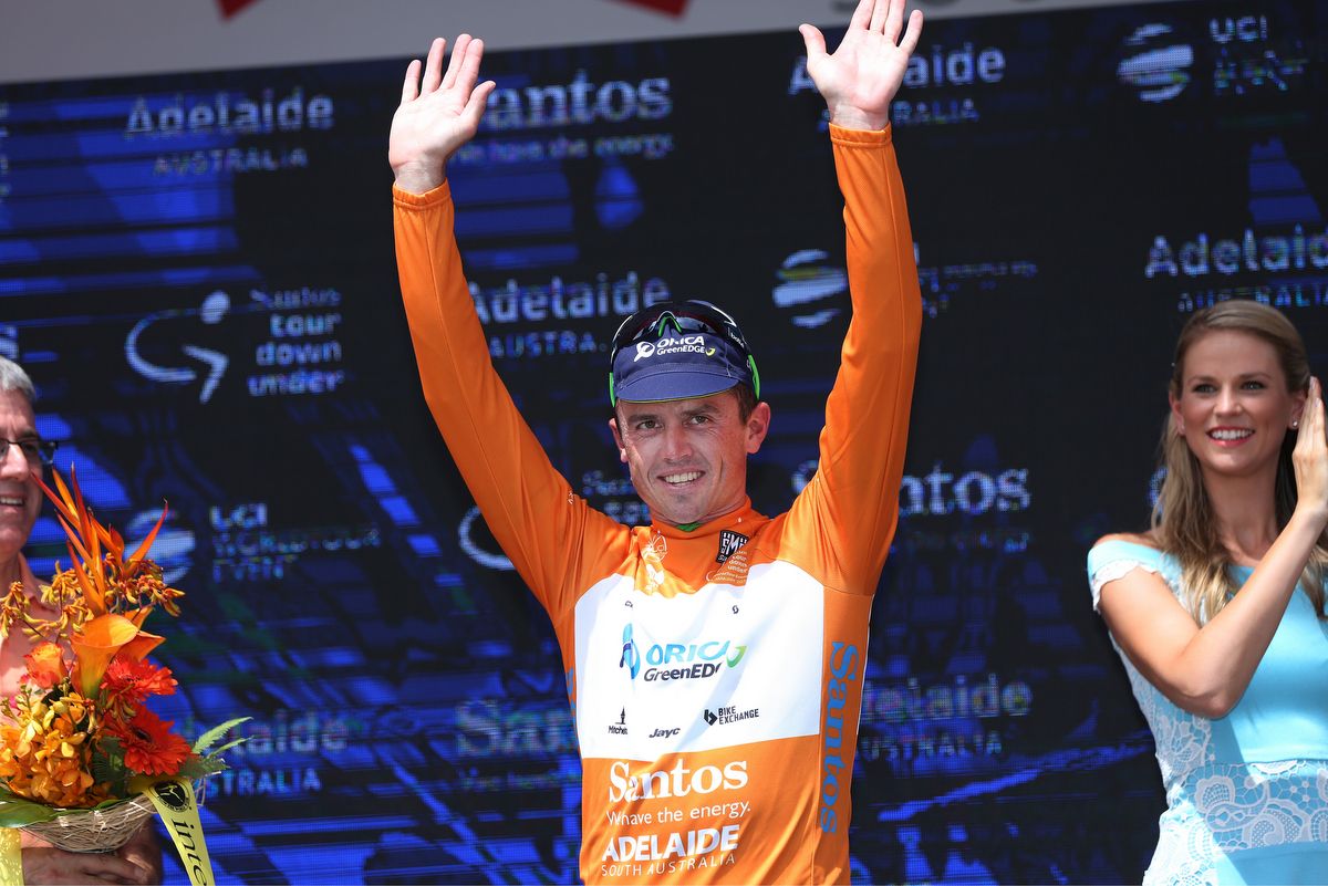 Simon Gerrans on the podium having collected his first ochre jersey of the race
