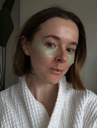 An image of Who What Wear UK's contributing beauty editor Grace Day wearing under-eye patches.