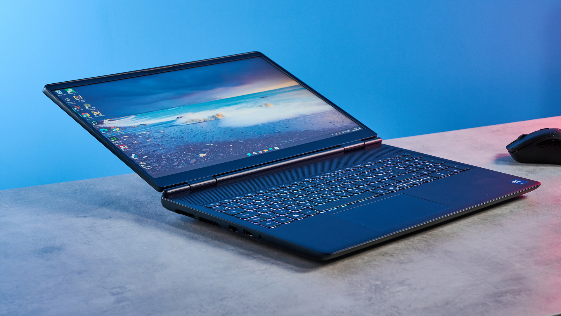 A blue Alienware 16X Aurora gaming laptop