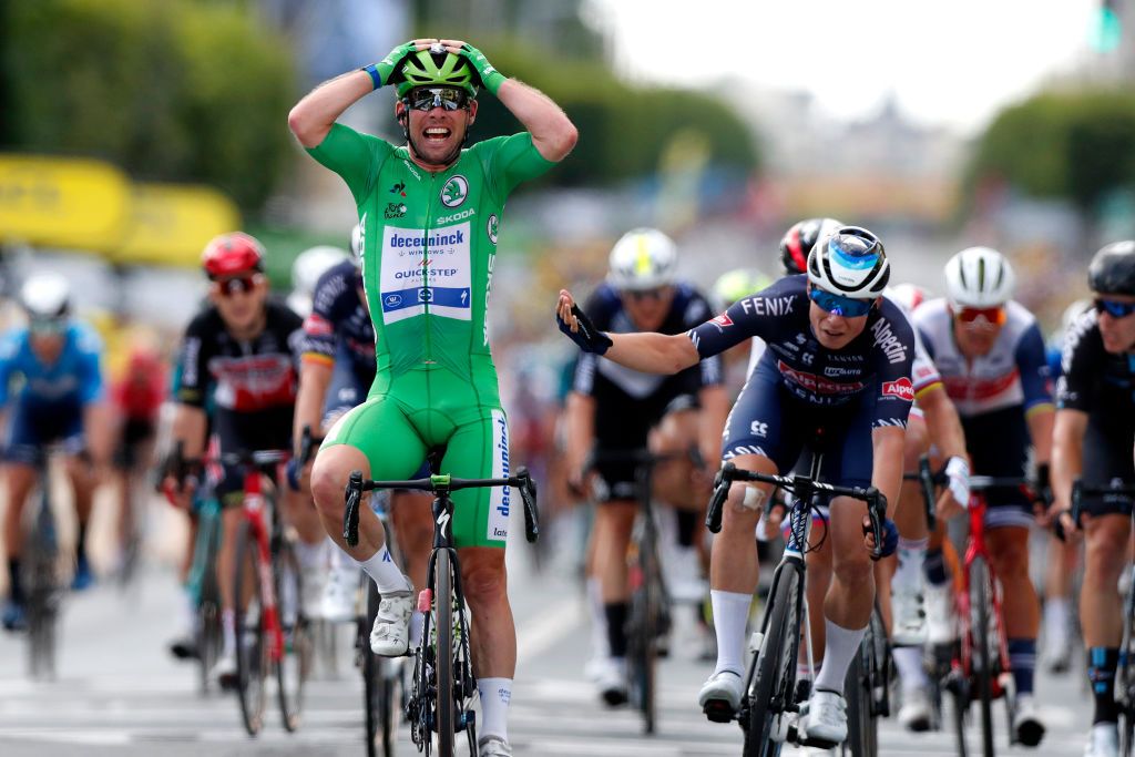 CHATEAUROUX FRANCE JULY 01 Mark Cavendish of The United Kingdom and Team Deceuninck QuickStep Green Points Jersey celebrates at arrival ahead of Jasper Philipsen of Belgium and Team AlpecinFenix during the 108th Tour de France 2021 Stage 6 a 1606km stage from Tours to Chteauroux LeTour TDF2021 on July 01 2021 in Chateauroux France Photo by Guillaume Horcajuelo PoolGetty Images