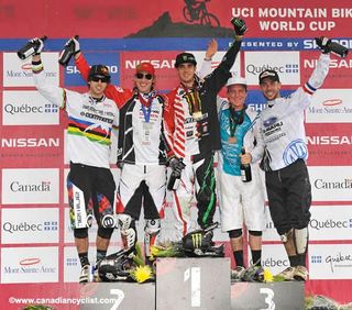 The elite men's downhill podium. It was Steve Peat's 50th and Aaron Gwin's first.