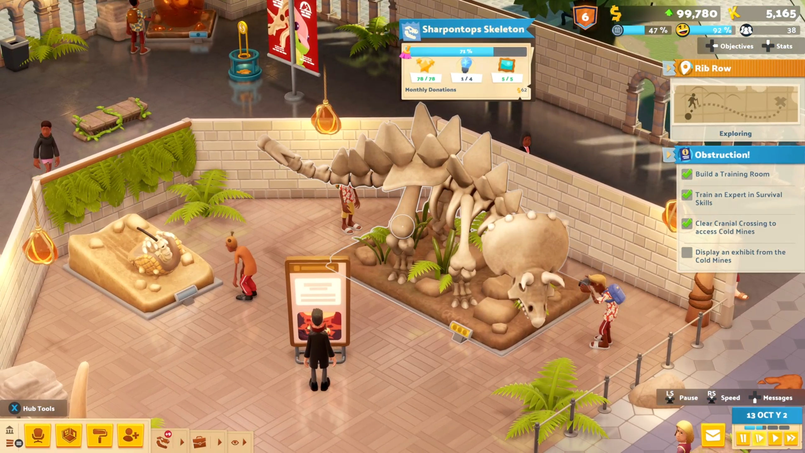 Two Point Museum gameplay screeenshots showing aquarium museums, spirit exhibits, and prehistoric exhibits.