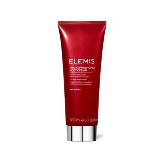 Elemis Frangipani Monoi Body Cream in a red squeeze tube bottle.