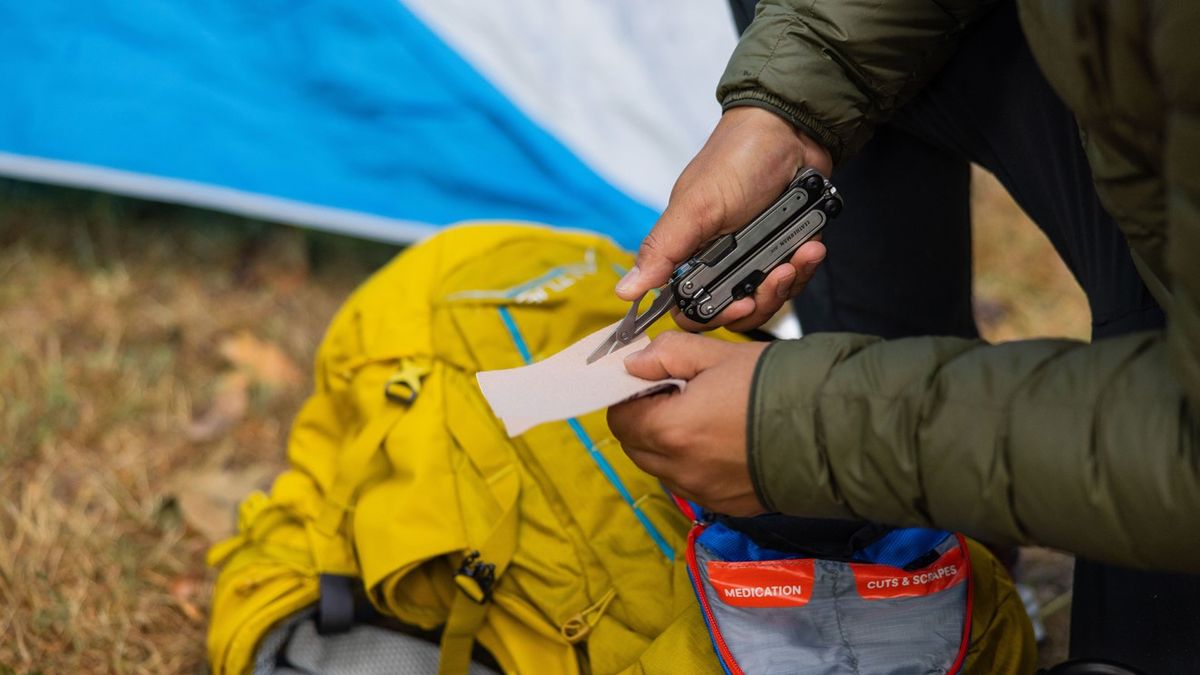 Man using Leatherman ARC multitool