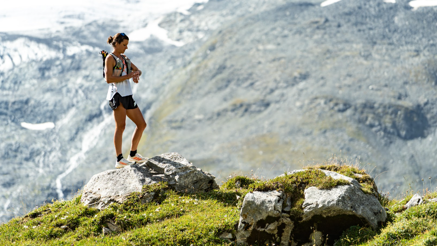 Ruth Croft checks her Amazfit watch in the Alps