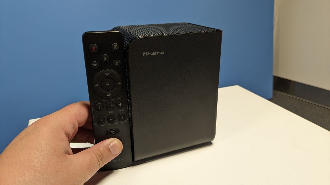 Hisense AX5125H rear speaker next to remote