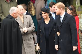 Britain's Prince Edward, Earl of Wessex (L), Meghan, Duchess of Sussex and Britain's Prince Harry, Duke of Sussex depart after the Royal Family's traditional Christmas Day service at St Mary Magdalene Church in Sandringham, Norfolk, eastern England, on December 25, 2018. (Photo by Paul ELLIS / AFP) (Photo credit should read PAUL ELLIS/AFP via Getty Images)