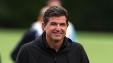 Scott O'Neil smiles towards the camera during the 2025 LIV Golf UK event