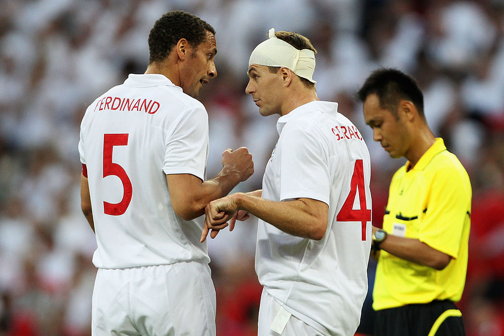 Rio Ferdinand and Steven Gerrard have a heated discussion while on England duty in 2010