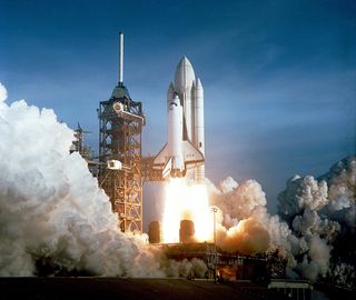 The first space shuttle mission, STS-1, launched on April 12, 1981, with astronauts John Young and Robert Crippen onboard space shuttle Columbia.