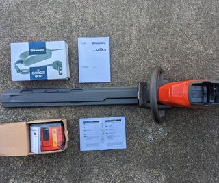 unboxing a hedge trimmer