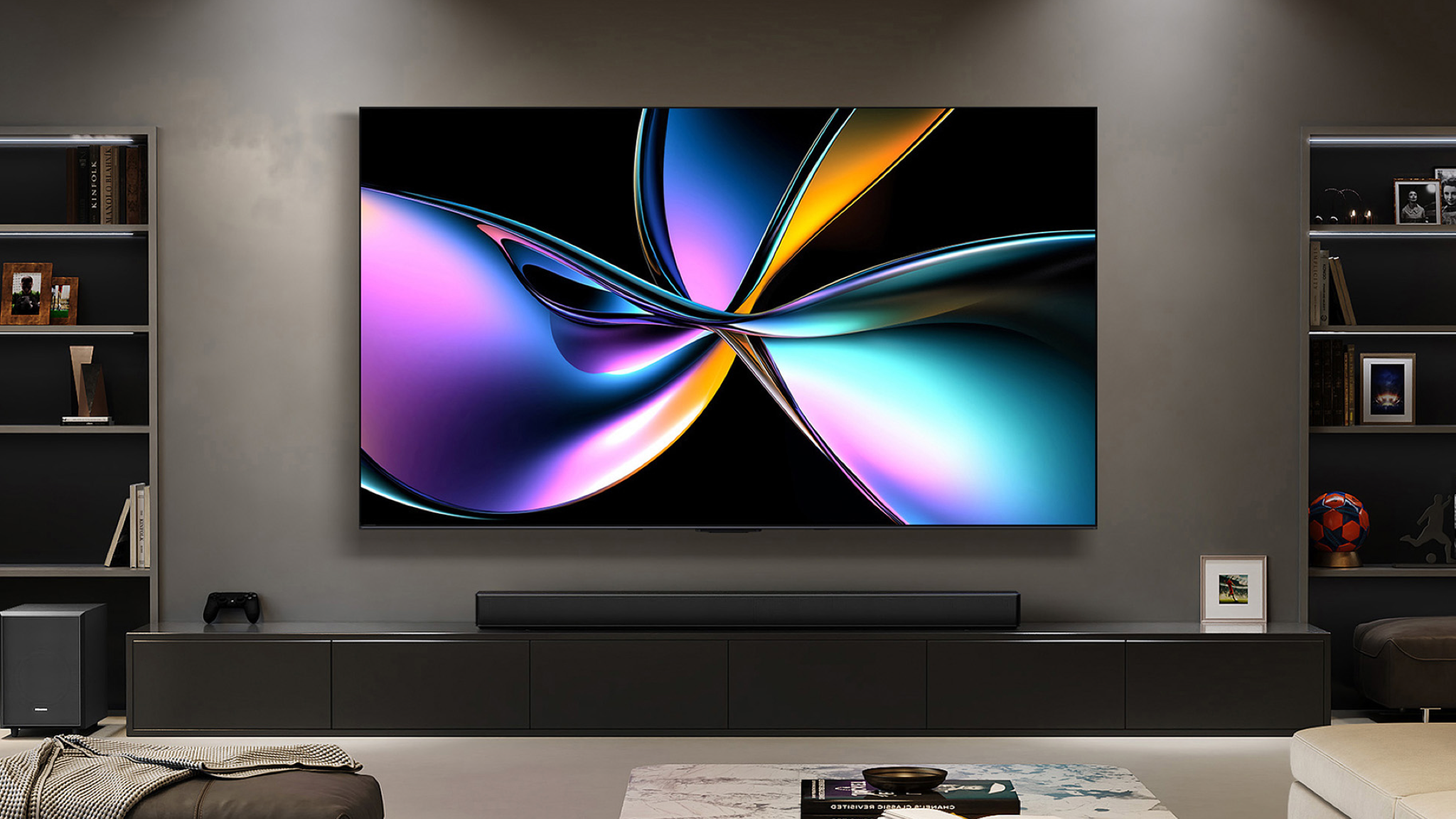Hisense U7Q Pro TV wall mounted in a large room with bookcases on either side and a soundbar below