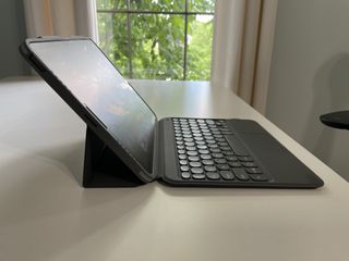 Zagg Pro Keys With Trackpad Wireless Keyboard With Trackpad And Detachable Case Lower Angle Lifestyle