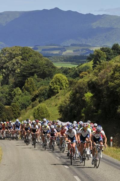The peloton ride through the undulating countryside.