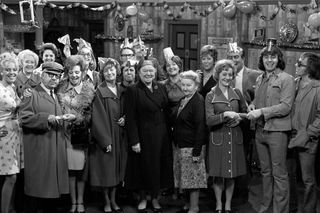 In 1974, Coronation Street stars during a Christmas Party sequence at the Rovers Return, as actress Anne Kirkbride (third left back) (PA)