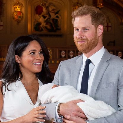 Meghan Markle and Prince Harry pose in St George's Hall at Windsor Castle on May 8, 2019.