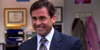 The Office Michael Scott grimaces in embarassment