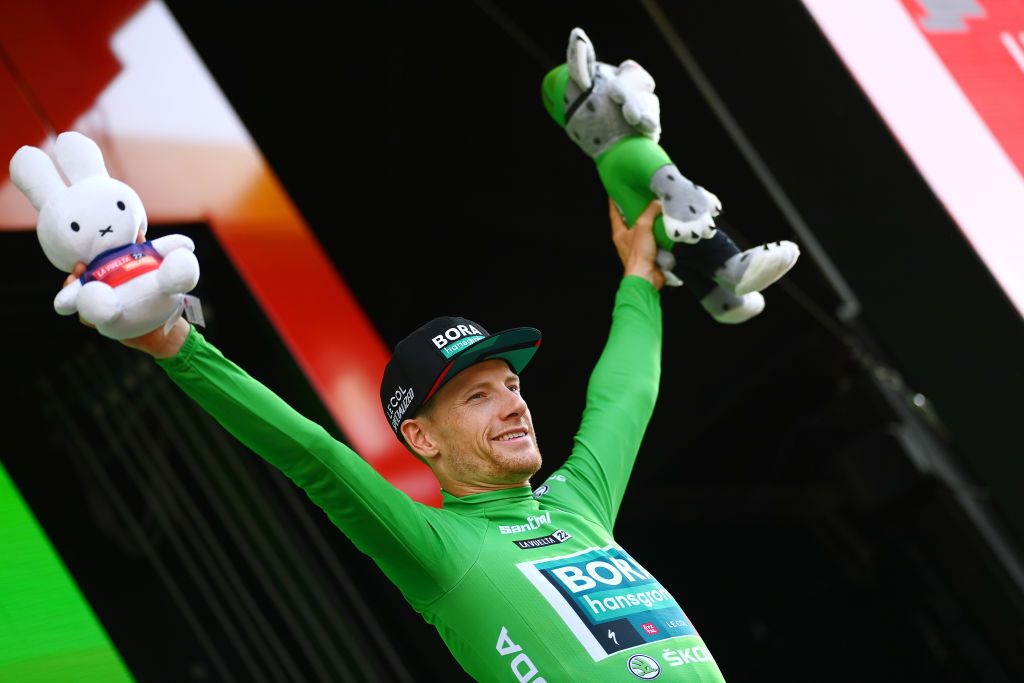 UTRECHT NETHERLANDS AUGUST 20 Sam Bennett of Ireland and Team Bora Hansgrohe celebrates winning the Green Points Jersey on the podium ceremony after the 77th Tour of Spain 2022 Stage 2 a 1751km stage from sHertogenbosch to Utrecht LaVuelta22 WorldTour on August 20 2022 in Utrecht Netherlands Photo by Tim de WaeleGetty Images