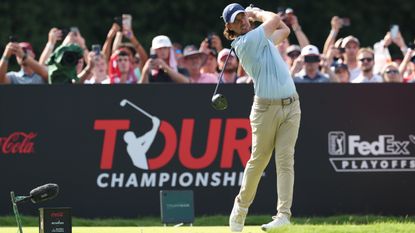 Tommy Fleetwood plays from the 18th tee during the final round of the Tour Championship 2025 at East Lake Golf Club 