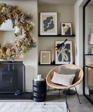 Neutrally decorated home dressed for Christmas with a large dried flower wreath around the mirror