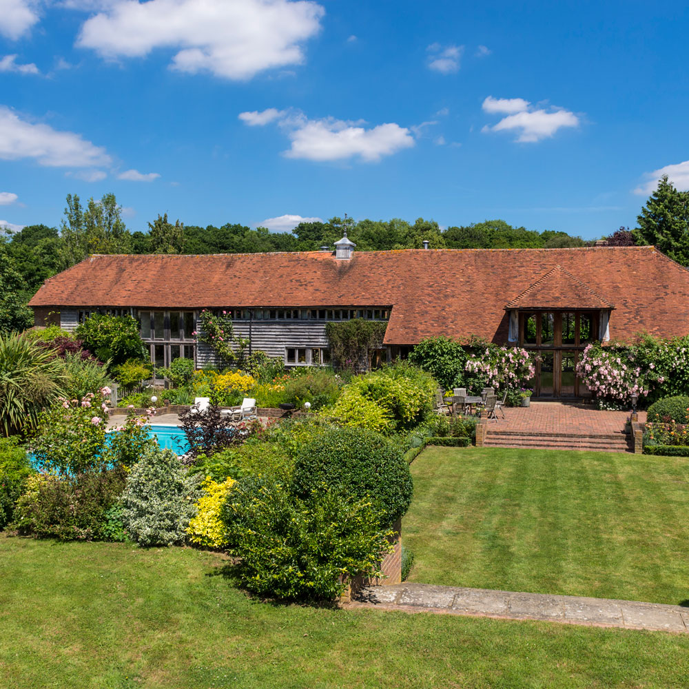 house with greenery and kent peg tiled roof topped 