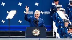 Troy Meink waving to the crowd during Space Force graduation ceremony